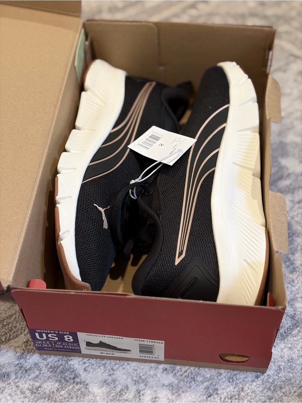 Puma Woman’s Focus Lite Black Sneakers with Gold Stripes
